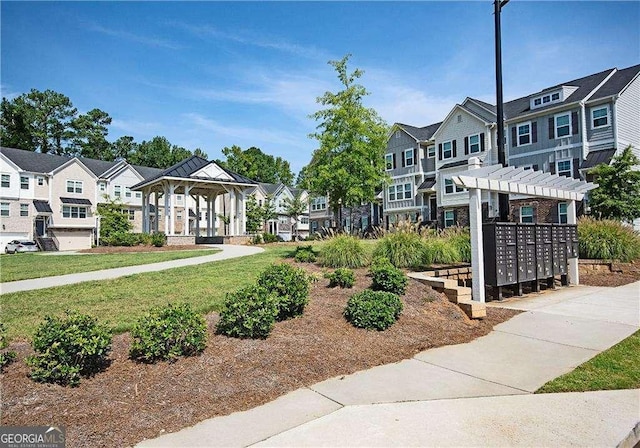 2539 Hedgeway Cir, Kennesaw, GA 30144 - view of property's community with a lawn, a gazebo, a residential view, and mail area