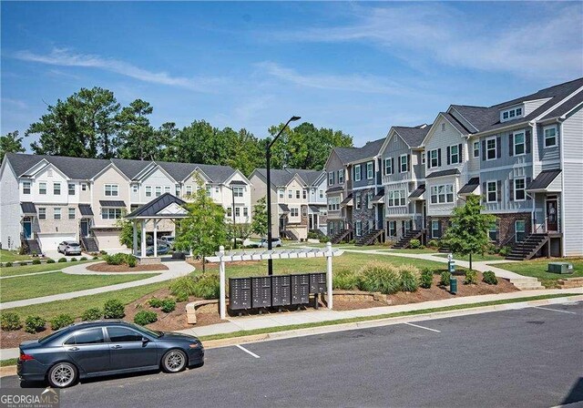 2539 Hedgeway Cir, Kennesaw, GA 30144 - exterior space featuring street lighting, curbs, sidewalks, and a residential view