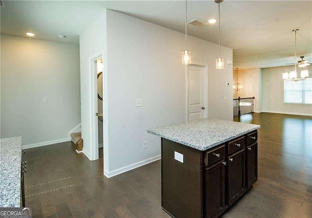 2539 Hedgeway Cir, Kennesaw, GA 30144 - kitchen featuring recessed lighting, baseboards, dark wood-style flooring, and dark brown cabinets