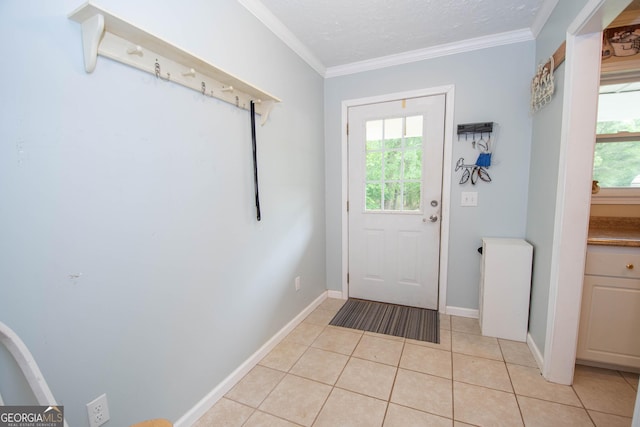 doorway with baseboards, ornamental molding, a textured ceiling, and light tile patterned flooring