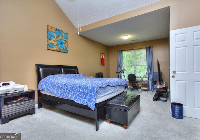 carpeted bedroom featuring visible vents, a textured ceiling, and vaulted ceiling