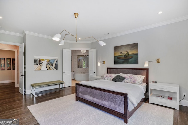 bedroom featuring an inviting chandelier, baseboards, wood finished floors, visible vents, and ornamental molding