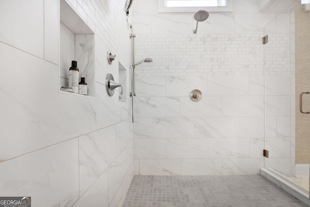 bathroom with a stall shower