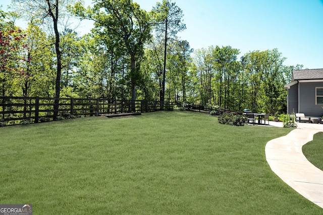 view of yard with fence