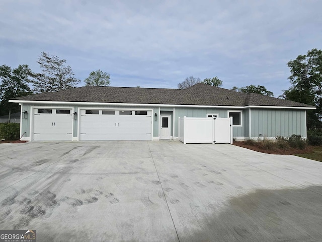 garage featuring driveway