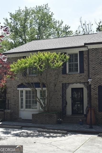 11 Ardmore Sq NW, Atlanta, GA 30309 - view of front of home featuring brick siding
