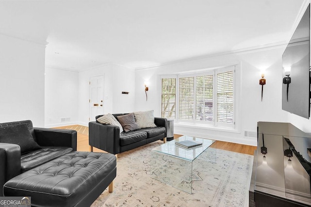 11 Ardmore Sq NW, Atlanta, GA 30309 - living area with baseboards, ornamental molding, and wood finished floors