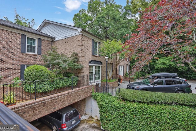 11 Ardmore Sq NW, Atlanta, GA 30309 - view of property exterior featuring brick siding