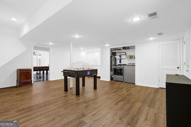 11 Ardmore Sq NW, Atlanta, GA 30309 - rec room featuring wood finished floors, recessed lighting, separate washer and dryer, and baseboards