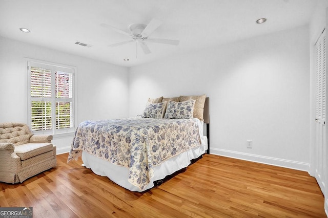 11 Ardmore Sq NW, Atlanta, GA 30309 - bedroom with wood finished floors, baseboards, ceiling fan, a closet, and recessed lighting