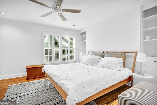 11 Ardmore Sq NW, Atlanta, GA 30309 - bedroom with baseboards, wood finished floors, a ceiling fan, and recessed lighting
