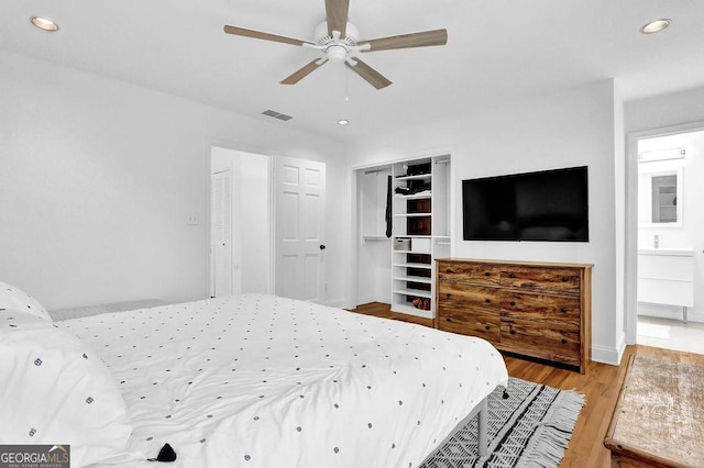 11 Ardmore Sq NW, Atlanta, GA 30309 - bedroom with wood finished floors, recessed lighting, baseboards, and ceiling fan