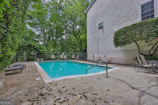 11 Ardmore Sq NW, Atlanta, GA 30309 - community pool featuring a patio area