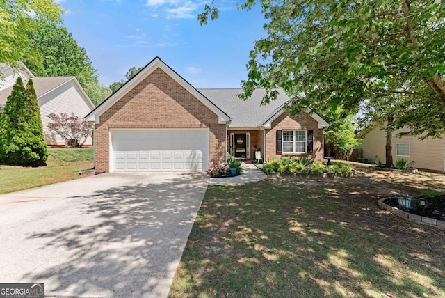 1338 Jefferson Station Rd, Jefferson, GA 30549 - view of front of home with brick siding, a garage, concrete driveway, and a front lawn
