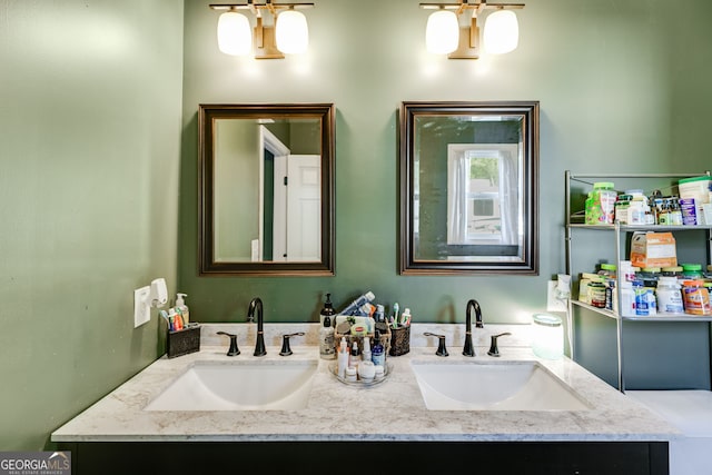 full bathroom featuring double vanity and a sink