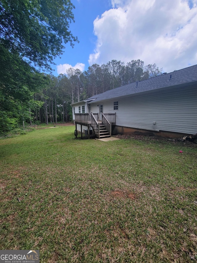 129 Carolyn Path, Rockmart, GA 30153 - back of property with a wooden deck and a lawn