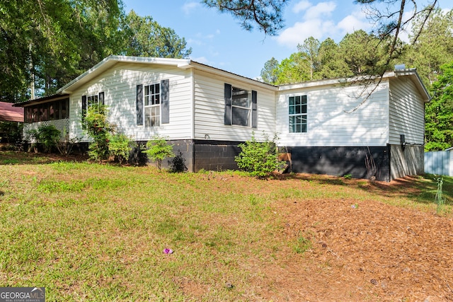 709 Tallapoosa Hwy, Cedartown, GA 30125 - view of side of home with a lawn