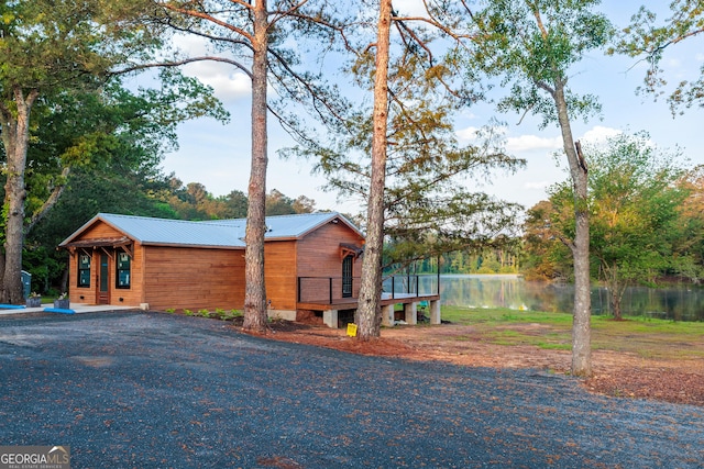 709 Tallapoosa Hwy, Cedartown, GA 30125 - view of side of home with a deck with water view and metal roof