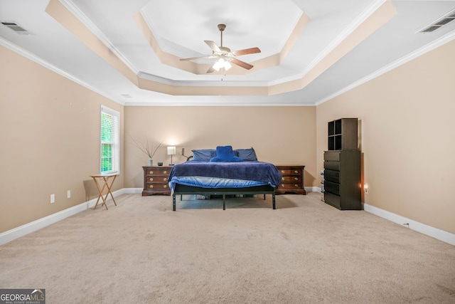 4616 Town Manor Dr, Douglasville, GA 30135 - carpeted bedroom featuring crown molding, baseboards, visible vents, and a raised ceiling