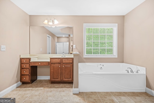 4616 Town Manor Dr, Douglasville, GA 30135 - full bathroom with vanity, baseboards, an enclosed shower, and a bath