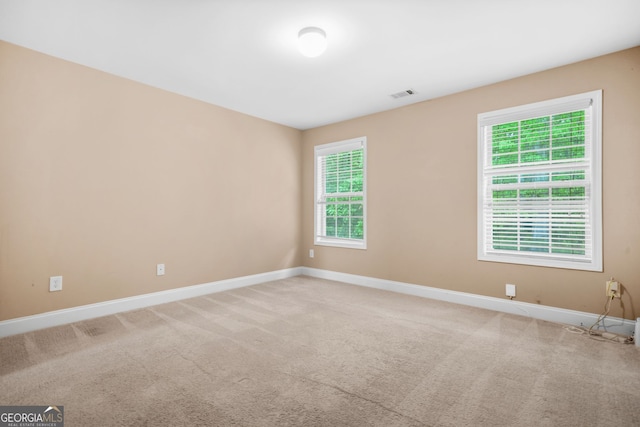 4616 Town Manor Dr, Douglasville, GA 30135 - unfurnished room featuring visible vents, baseboards, and plenty of natural light