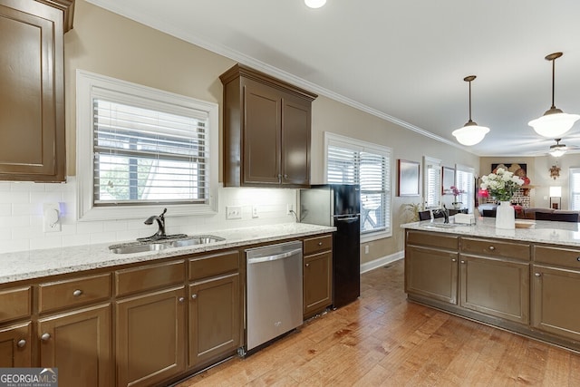 55 Sudderth St, Buford, GA 30518 - kitchen featuring stainless steel dishwasher, ornamental molding, open floor plan, a sink, and hanging light fixtures