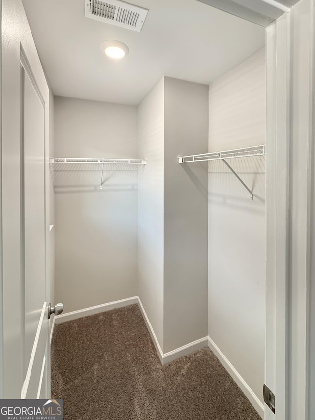 376 Layfield Dr, Jonesboro, GA 30238 - spacious closet featuring visible vents and carpet