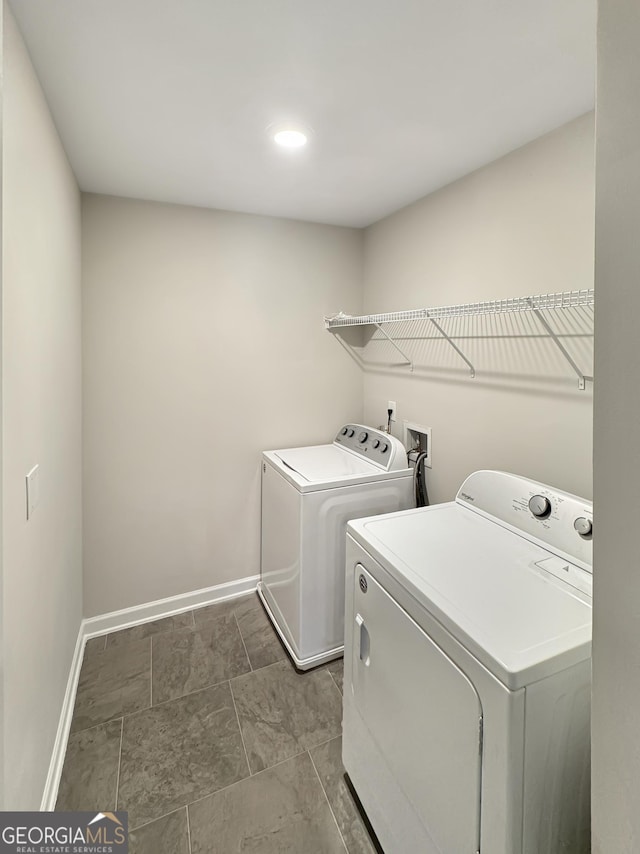 376 Layfield Dr, Jonesboro, GA 30238 - washroom with separate washer and dryer, laundry area, and baseboards