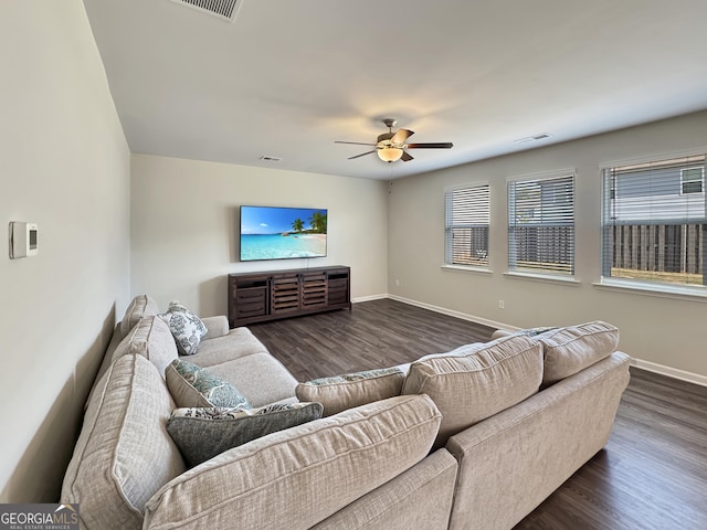 376 Layfield Dr, Jonesboro, GA 30238 - living room with baseboards, visible vents, dark wood-style floors, and ceiling fan