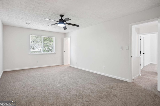 3688 Burnley Ct, Lithonia, GA 30038 - unfurnished room featuring a textured ceiling, carpet, and ceiling fan