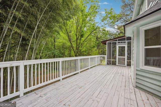3688 Burnley Ct, Lithonia, GA 30038 - wooden terrace featuring a sunroom