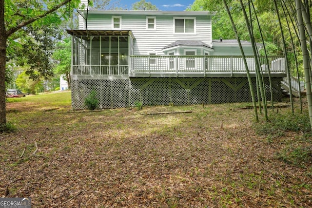 3688 Burnley Ct, Lithonia, GA 30038 - rear view of property featuring a wooden deck, a sunroom, and a chimney