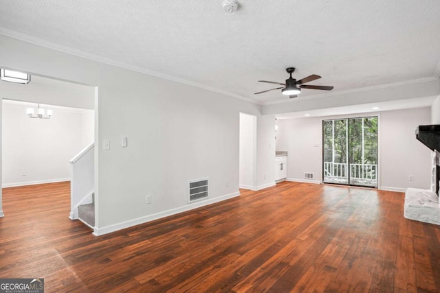 3688 Burnley Ct, Lithonia, GA 30038 - unfurnished living room featuring baseboards, visible vents, hardwood / wood-style flooring, and ceiling fan with notable chandelier