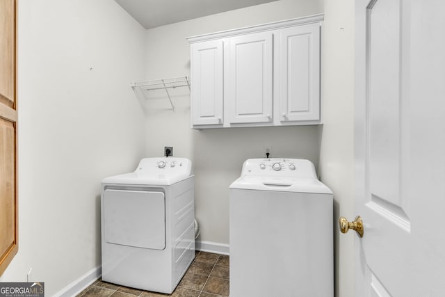 5303 Davenport Mnr, Cumming, GA 30041 - laundry area featuring cabinet space, baseboards, and washer and clothes dryer