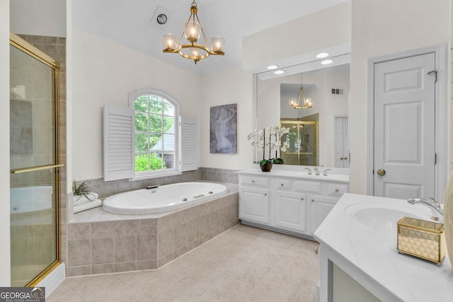 5303 Davenport Mnr, Cumming, GA 30041 - bathroom featuring a notable chandelier, a shower stall, and a sink