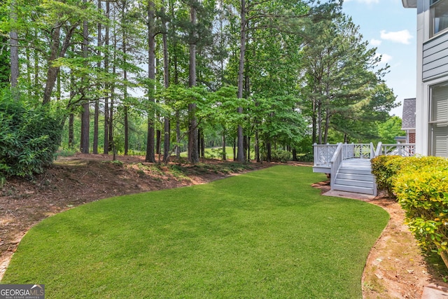 5303 Davenport Mnr, Cumming, GA 30041 - view of yard with a wooden deck