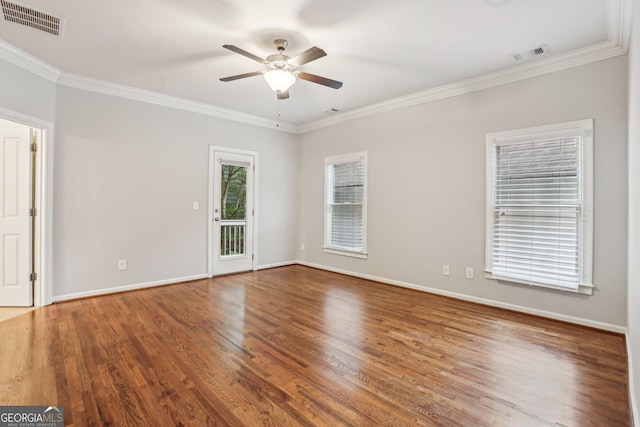 737 St Charles Ave NE, Atlanta, GA 30306 - unfurnished room with ceiling fan, crown molding, wood finished floors, and baseboards