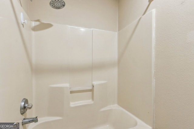 full bath featuring shower / tub combination