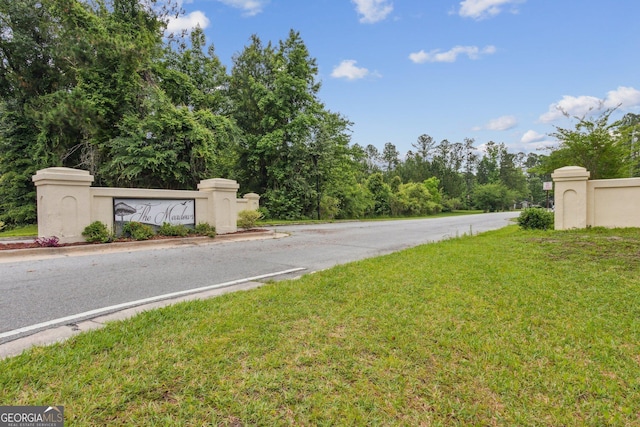 view of road with curbs