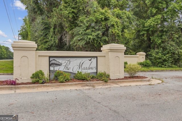 view of community sign