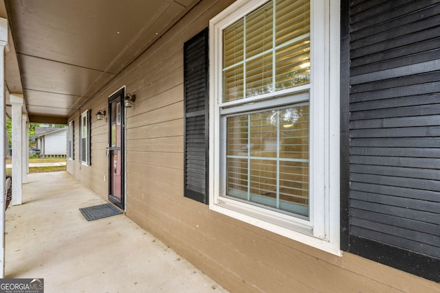 view of patio featuring a porch
