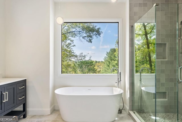 420 Martin Rd, Ellijay, GA 30536 - full bathroom featuring baseboards, a freestanding bath, a shower stall, and vanity