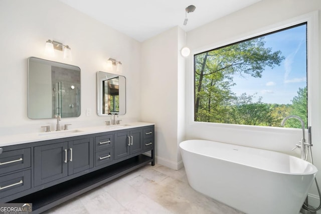 420 Martin Rd, Ellijay, GA 30536 - full bath with double vanity, a freestanding tub, a shower stall, and a sink