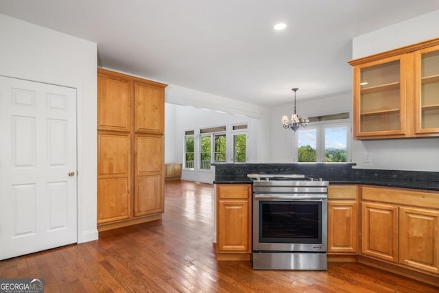 420 Martin Rd, Ellijay, GA 30536 - kitchen featuring dark stone counters, electric range, a notable chandelier, and dark wood finished floors