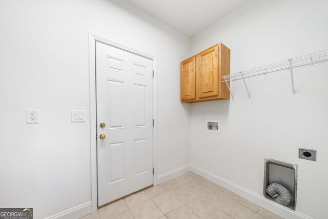 420 Martin Rd, Ellijay, GA 30536 - laundry room with cabinet space, washer hookup, baseboards, light tile patterned floors, and hookup for an electric dryer