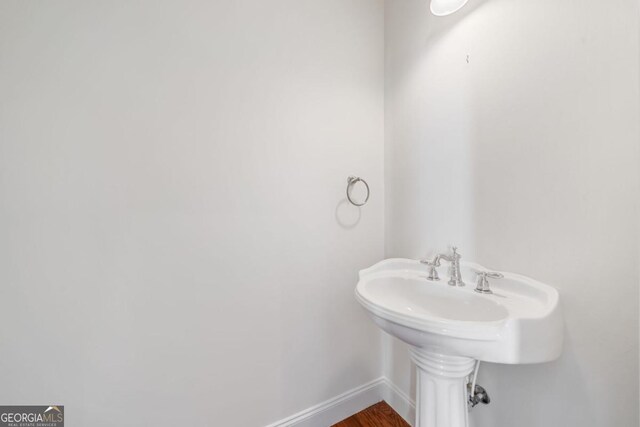 420 Martin Rd, Ellijay, GA 30536 - bathroom featuring baseboards and wood finished floors