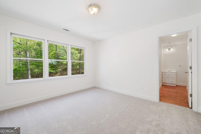 420 Martin Rd, Ellijay, GA 30536 - unfurnished bedroom featuring visible vents, baseboards, and carpet floors