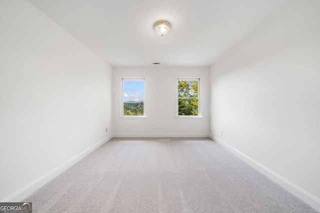 420 Martin Rd, Ellijay, GA 30536 - unfurnished room featuring baseboards and light colored carpet