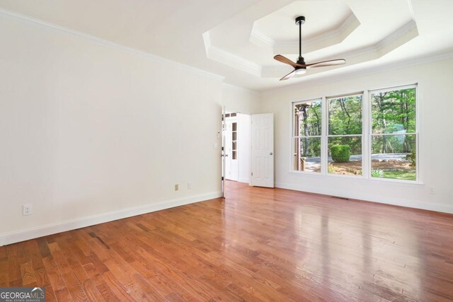 420 Martin Rd, Ellijay, GA 30536 - spare room with crown molding, a ceiling fan, wood finished floors, and a raised ceiling