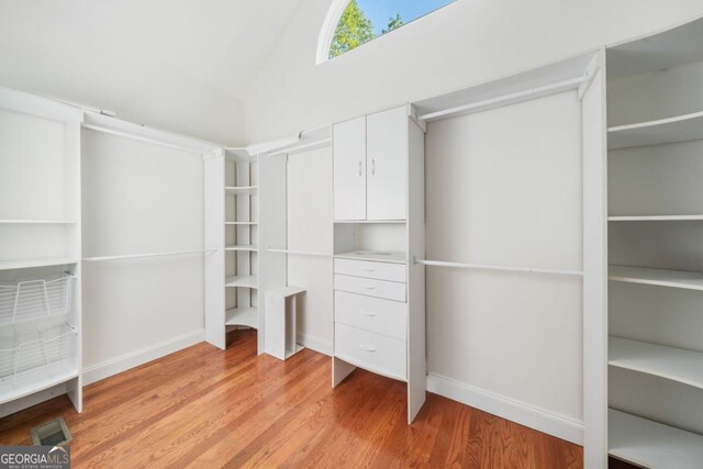420 Martin Rd, Ellijay, GA 30536 - walk in closet with light wood-type flooring and high vaulted ceiling